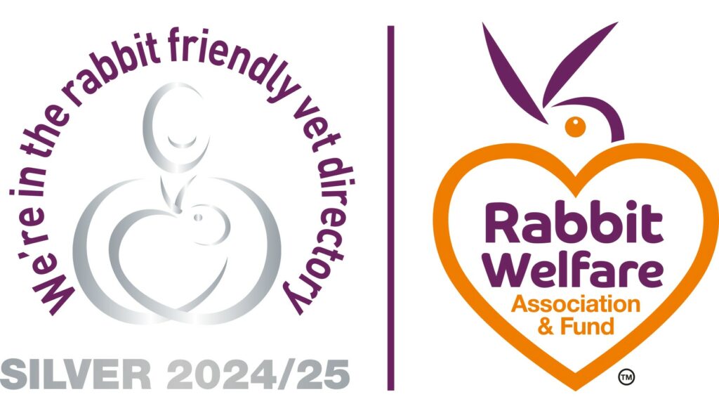 Two logos: on the left, a silver apple and words saying we are in the Silver 2024/25 rabbit-friendly vet list; on the right, an orange heart and Rabbit Welfare Association & Fund, showing our accreditations.