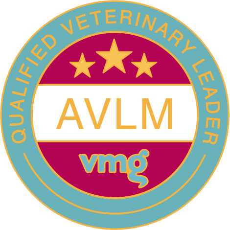 A round badge says QUALIFIED VETERINARY LEADER around the outside, with AVLM and Richard Sanderson in the middle. Three stars are above, VMG is below, all in gold and white on teal and maroon colours.